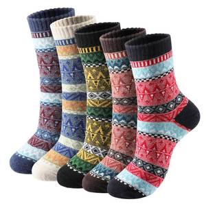 lot 3334 image: Trifabricy Wool Socks for Women - 5 Pairs Comfortable and Warm Womens Wool Socks, Vintage Womens Winter Sock, Super Soft Thick Knit Cozy Crew Cabin Sock Gifts For Women, Wave - Retail $101