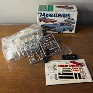 lot 1059 image: WOW Vintage 1974 MPC Chrysler Challenger Model Kit in Original Packaging Unassembled and Appears Complete