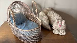 lot 1080 image: Decorative Wicker Baby Basket Carrier with Blue Cushion & Handmade Stuffed Pillow Cat