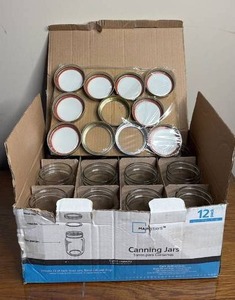 lot 1106 image: Canning Jars with Lids and Rings (1 pint capacity)