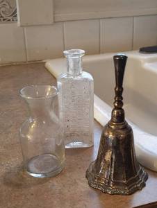 lot 813 image: Antique Glass Medicine Bottle and Avon Silver Plated Bell