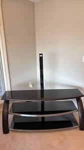 lot 714 image: Sturdy Glass and Wood High Quality TV Stand Approximately 4.5 Foot Wide and 4 Foot Tall Mount with a Graduated Shelving 18 Inches at Deepest Point