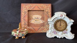 lot 720 image: Victorian Porcelain Clock ( winder stuck )with Floral Design Tea Cup Decor and Charming Porcelain Basket
