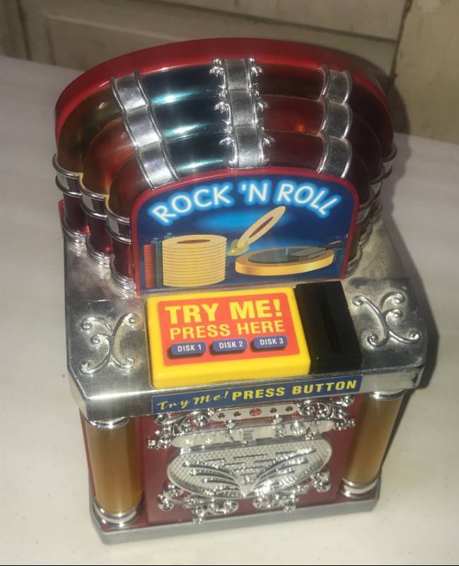 lot 5790 image: Musical Light Up Jukebox Bank - WOW