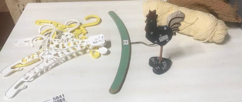lot 5841 image: Lot of Baby Clothes Hangers, Yarn and a Wooden Rooster