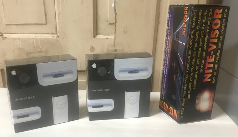 lot 5842 image: Nite Vision Car Visor (NIB) and two Universal Apple iPod Docks in original packaging