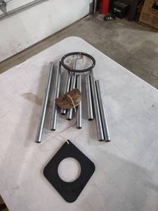 lot 836 image: Large Metal Wind Chimes with Wooden Striker has one chime loose