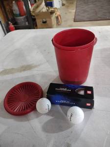 lot 851 image: Wilson Tour Titanium Golf Balls with Storage Cup