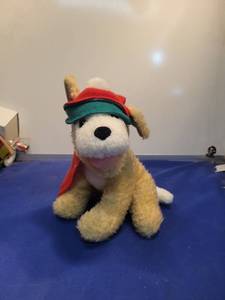 lot 4968 image: Christmas Dog Plush with Red and Green Cap