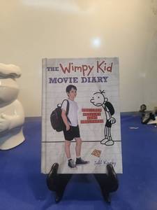 lot 5048 image: The Wimpy Kid Movie Diary by Jeff Kinney