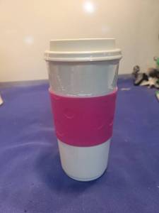lot 5051 image: Reusable Travel Mug with Pink Silicone Grip