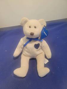 lot 5136 image: White Heart Bear Plush with Blue Ribbon