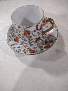 lot 5903 image: Floral Porcelain Teacup and Saucer Set with Gold Trim