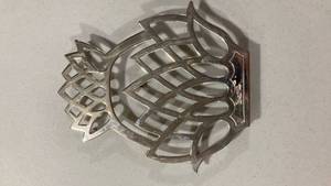 lot 6785 image: Silver Geometric Metal Trivet 9 inch
