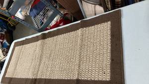 lot 6856 image: Textured Area Rug with Brown Border 55 x 21