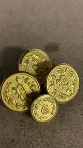 lot 101 image: RC50 vintage Police uniform buttons set of 4 - 58 inch (1) 78 inch (3)