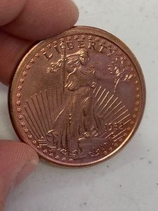 lot 16 image: 1 oz 999 Fine Copper Round 1933 Saint-Gaudens design