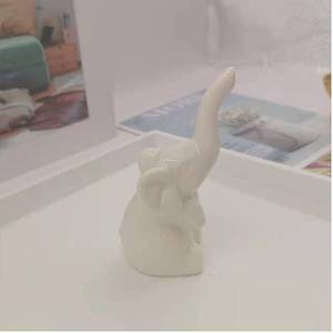 lot 72053 image: White Elephant Statue and Figurines Home Decor, Christmas White Elephant Gifts, Small Shelf Decor Accents, Modern Mini Knick Knacks for Living Room, Ceramic Decorative Objects for Shelves - Retail $8