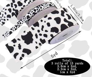 lot 72180 image: 2 Rolls Cow Print Ribbon - 15 Yards, Cow Spot Pattern, Animal Print, Black and White for DIY Crafts, Gift Wrapping, Party Decorations (2 Sizes Mix) - Retail $7