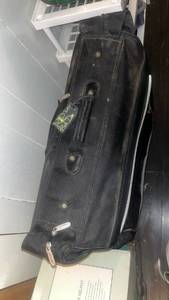lot 62024 image: Skyline Black Garment Bag with Disney Tag
