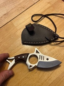lot 7 image: Beautiful and Unique Pocket Sized Steel Shark Blade, Wooden Handle, Finger Hole, Leather Sheath W String