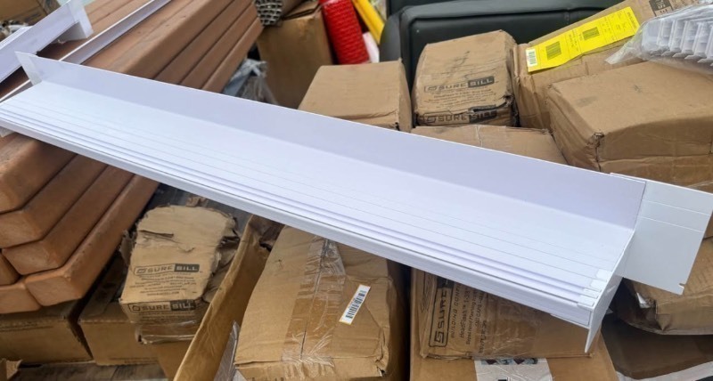 lot 546 image: SureSill 6-916 in. x 40 in. PVC Sloped Sill Pan Flashing Kit for Single Doors and Windows (End Dams)
