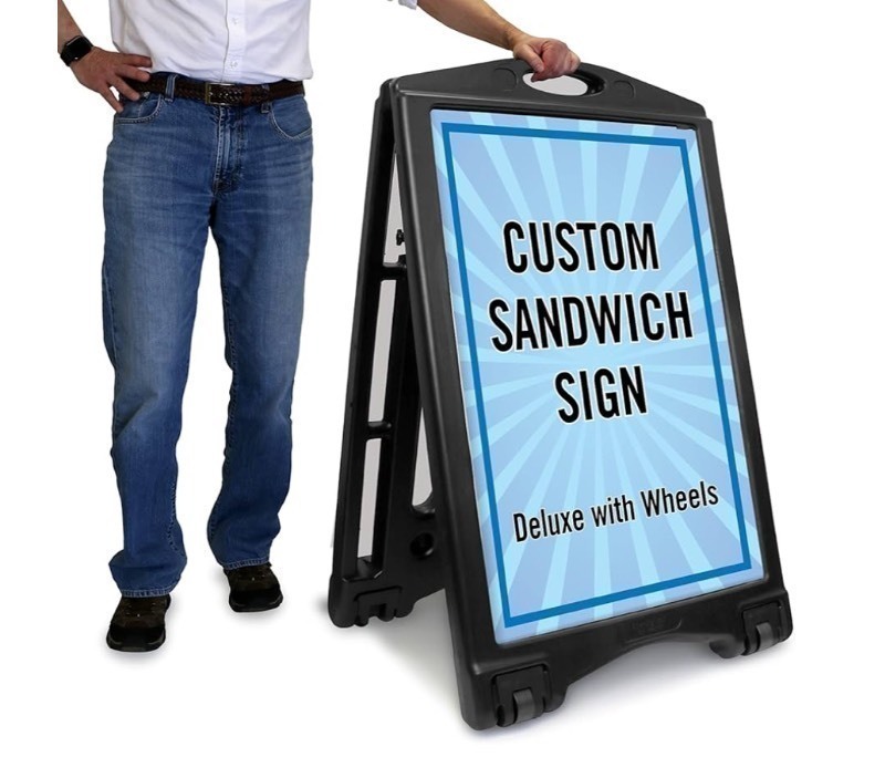 lot 5 image: SmartSign Custom BigBoss Sidewalk SignA-Frame Sandwich Board for 36 x 24 inch signs, sign inserts sold separately, Thermoplastic, Black frame only - Wheels included retails $125