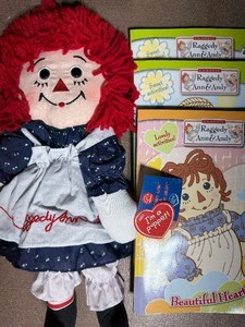 lot 235 image: Raggedy Ann Puppet and Coloring Books, New