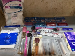lot 77 image: Make Up Brushes and More in Pink Basket