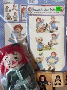 lot 190 image: Raggedy Ann and Andy Iron-On Transfers, Rubber Stamps and Doll