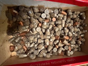 lot 629 image: Reloading Equipment - Bullets in a Cigar Box