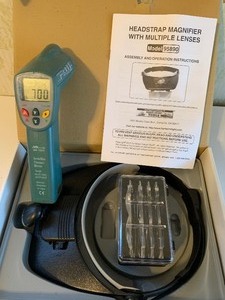 lot 707 image: Infrared Thermometer and Head Magnifier w Multiple Lenses