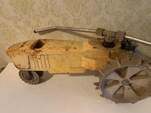 lot 717 image: Nelson Rain Train Cast Iron Traveling Lawn Sprinkler