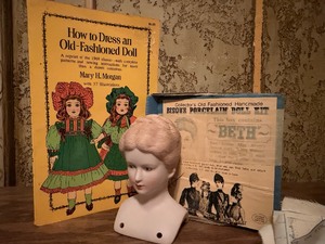 lot 516 image: How to Dress an Old-Fashioned Doll Book and Vintage Doll Kit (Beth)