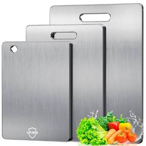 lot 48279 image: UFJEG Titanium Cutting Board Set of 3, Titanium Cutting Boards for Kitchen, Non Toxic, Double-Sided Food Grade Chopping Board for Cutting Meat Vegetable Fruit, Outdoor Camping