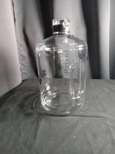 lot 1018 image: Clear Daily Water Tracker Bottle with Time Markings