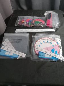 lot 1110 image: Students Clock Face and Fraction Tiles Teaching Set