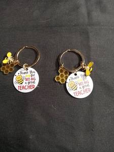 lot 1111 image: Teacher Appreciation Bee Keychain Set