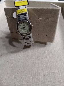 lot 12470 image: Geneva Quartz Water Resistant Watch with Metal Band