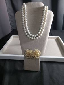 lot 12490 image: Double Strand White Pearl Necklace with Matching Cluster Earrings