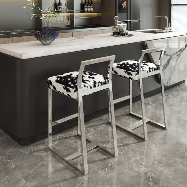 lot 7 image: Counter Height Bar Stools Set of 2, 26 Cow Print Padded Barstools with Silver Chrome Metal Legs &amp Backrest, Armless Modern Kitchen Chairs - Retail $189