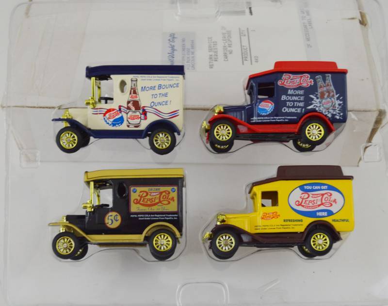 lot 4670 image: 4 Pepsi Diecast Trucks 164 Scale