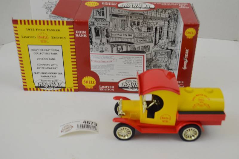 lot 4673 image: 1912 Ford Shell Die Cast Coin Bank Truck 124
