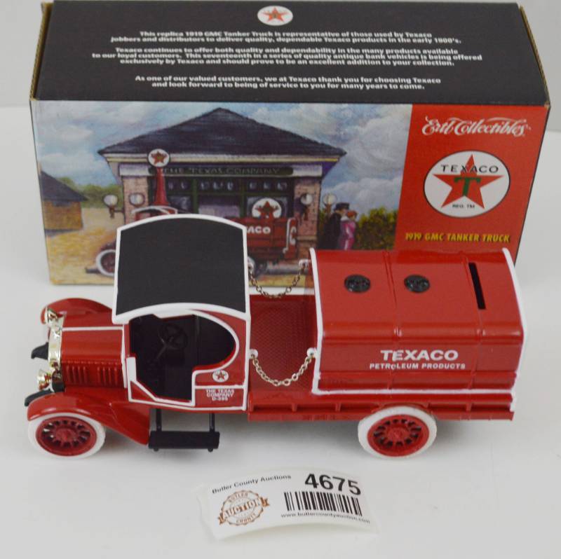 lot 4675 image: Texaco 1919 GMC Tanker Die Cast Coin Bank
