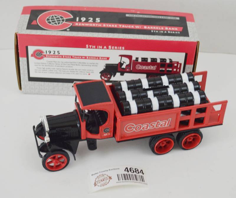 lot 4684 image: Coastal 1925 Kenworth Stake Truck W Barrels Die Cast Coin Bank #5 in Series
