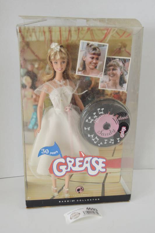 lot 4693 image: Grease Sandy Barbie W Musical Doll Stand 30 Year Anniversary Edition