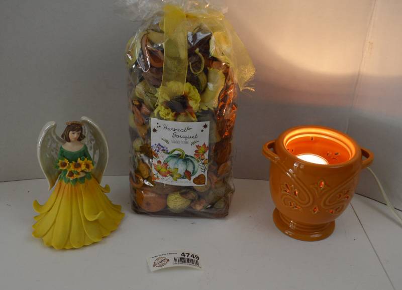 lot 4749 image: New Harvest Bouquet Potpourri, Avon Sunflower Figurine (Some Flower Petals Broken), and Wax Warmer(Missing Wax Tray)