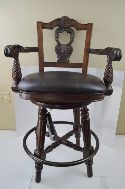 lot 4799 image: Excellent Condition Ashley Furniture Swiveling Bar Stool 27 T To Seat and 44 T to Back (Shorter Than Other Two Chairs)