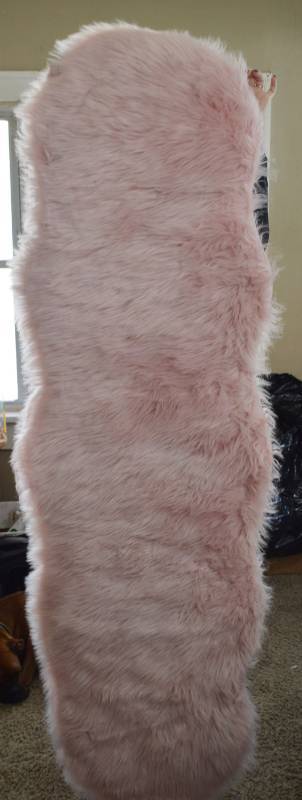 lot 4832 image: New W Tags Pink Faux Lambskin Rug 21W x 71 L