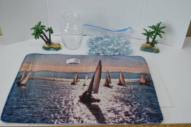 lot 4841 image: Beach Decor, Bath Mat, Palm Tree Figurines Vase Glass Stones and Rocks